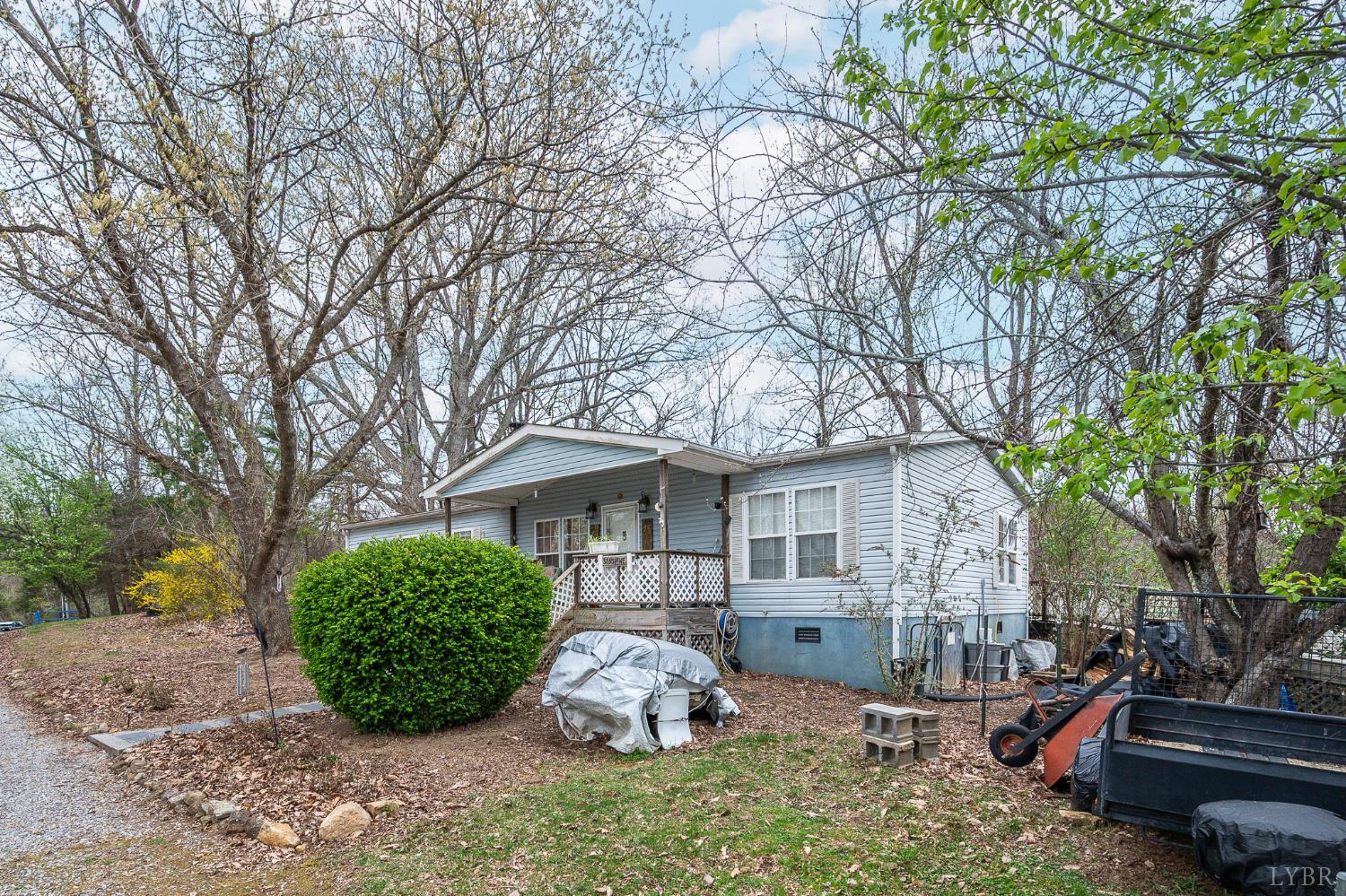 4400 Murray Hollow Road Thaxton, VA 24174 - Photo 11 of 56 a front view of a house with garden