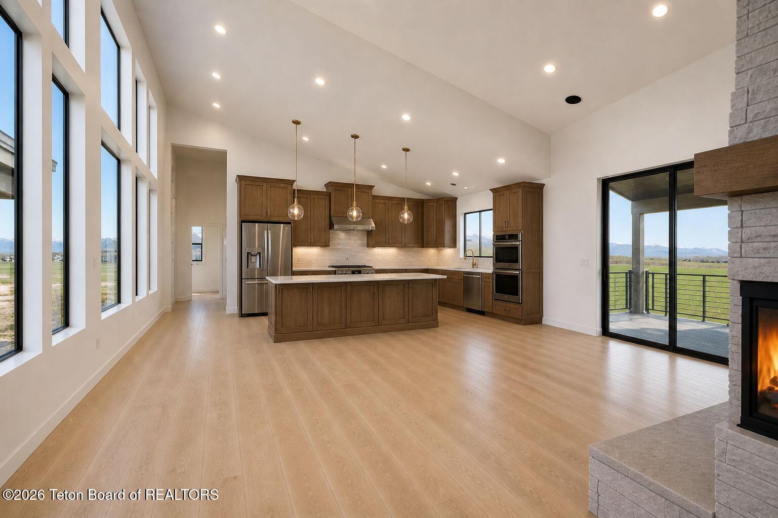 204 Dick Casull Loop Freedom, WY 83120 - Photo 11 of 56 Digitally Altered AI staging- Kitchen