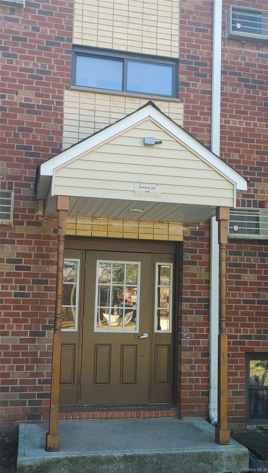 106 Union Road, Unit 3J Spring Valley, NY 10977 - Photo 3 of 15 a front view of a house with glass windows