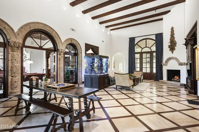 a room with furniture and a chandelier