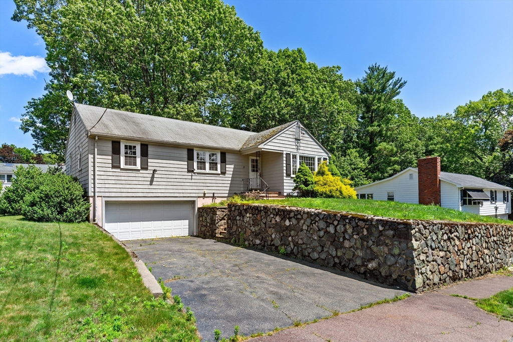 29 Gregory Road Wakefield, MA 01880 - Photo 5 of 29 front view of a house with a street