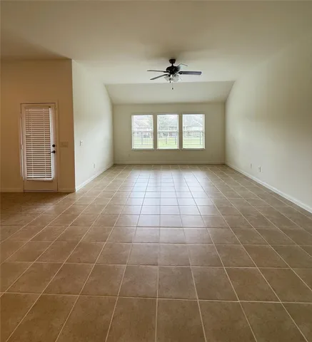 a view of kitchen with stainless steel appliances cabinets