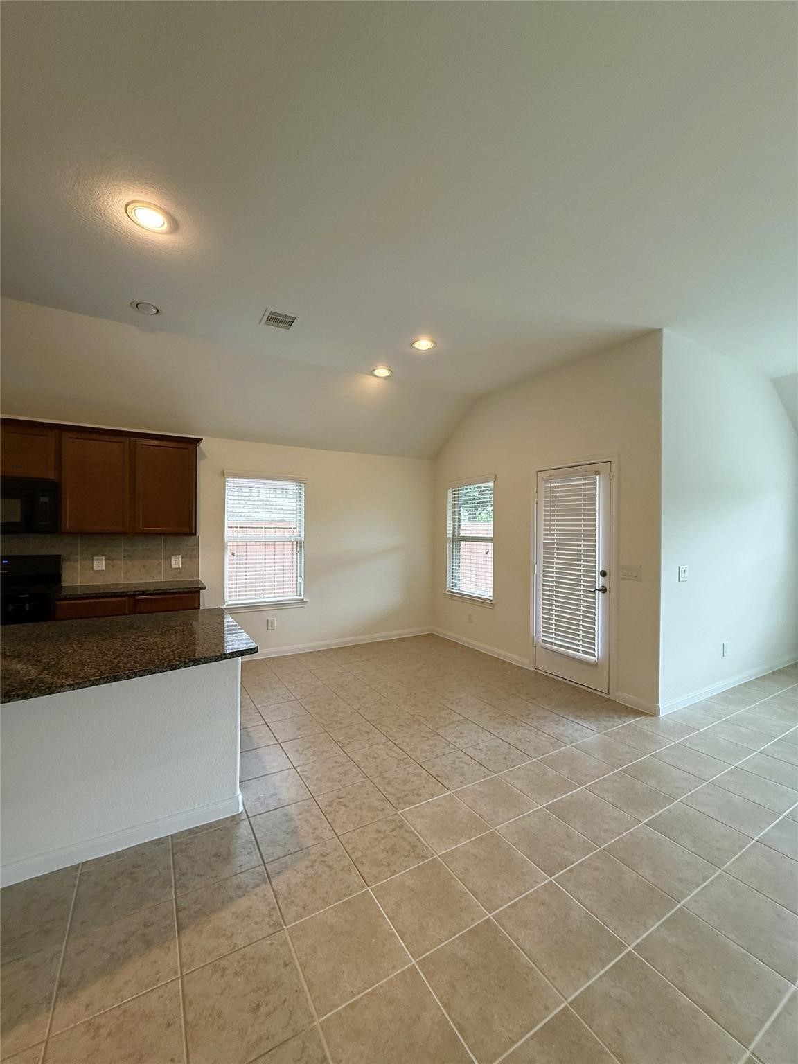 22646 Triangle Ridge Drive Porter, TX 77365 - Photo 7 of 17 a view of a kitchen with a sink and a window