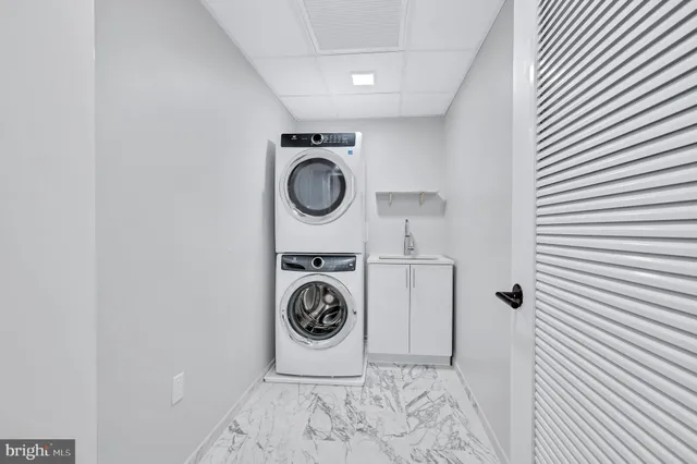 a view of a storage & utility room with a window