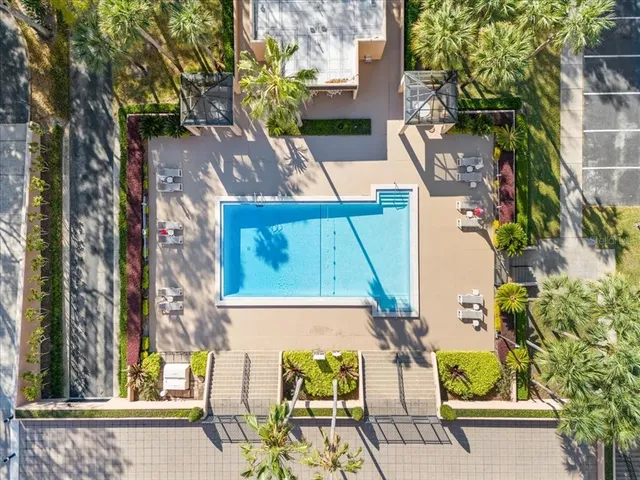 front view of a house with a tree