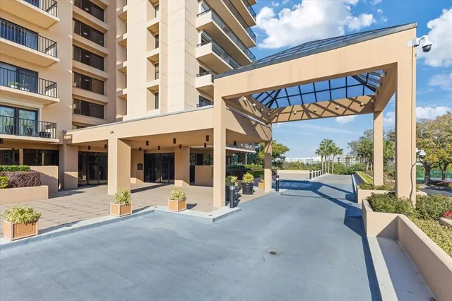 a view of a building with sitting area