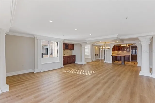 a view of a livingroom with wooden floor