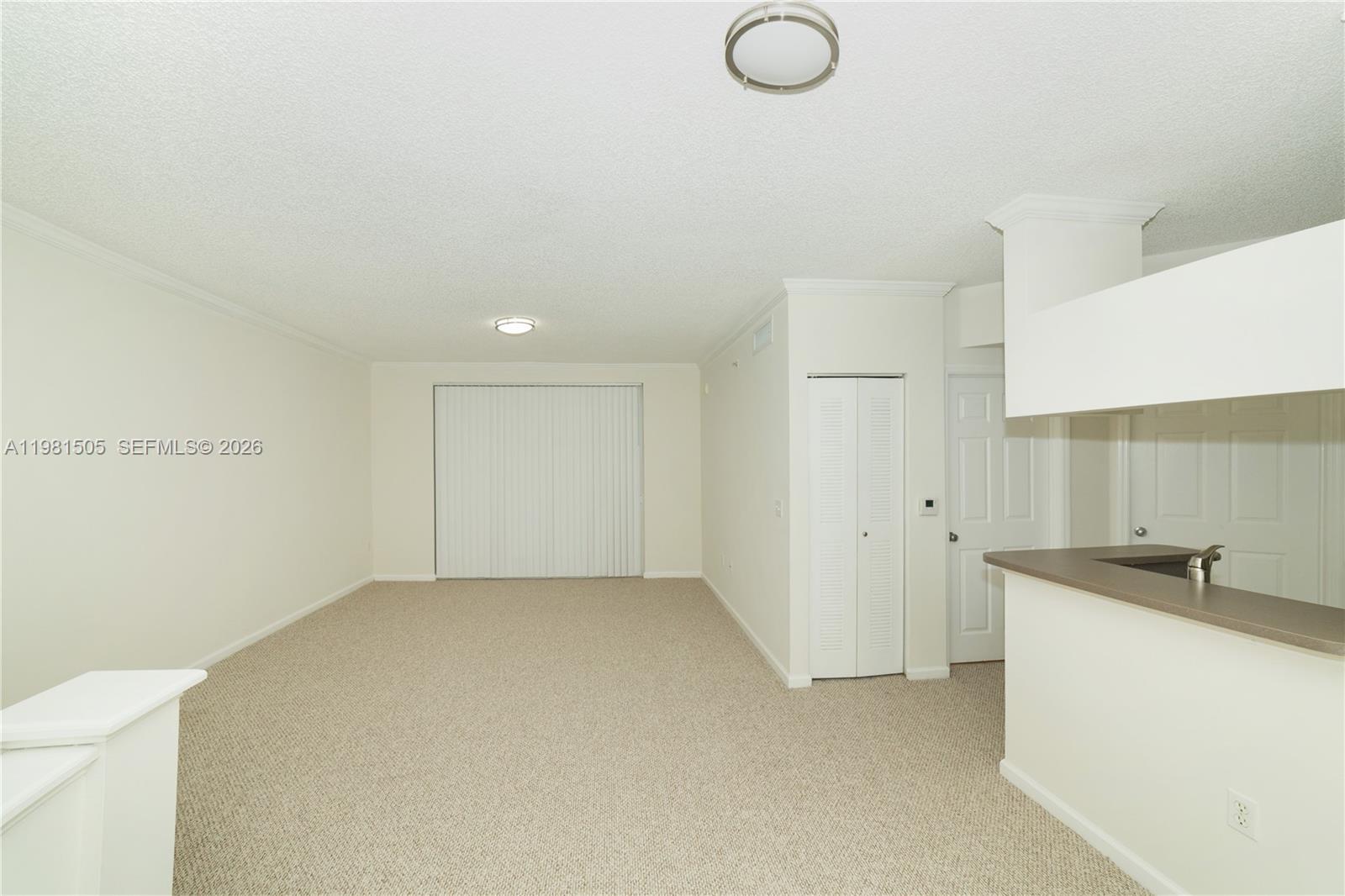 17145 North Bay Road, Unit 4203 Sunny Isles Beach, FL 33160 - Photo 2 of 50 a view of a utility room with two washing machine