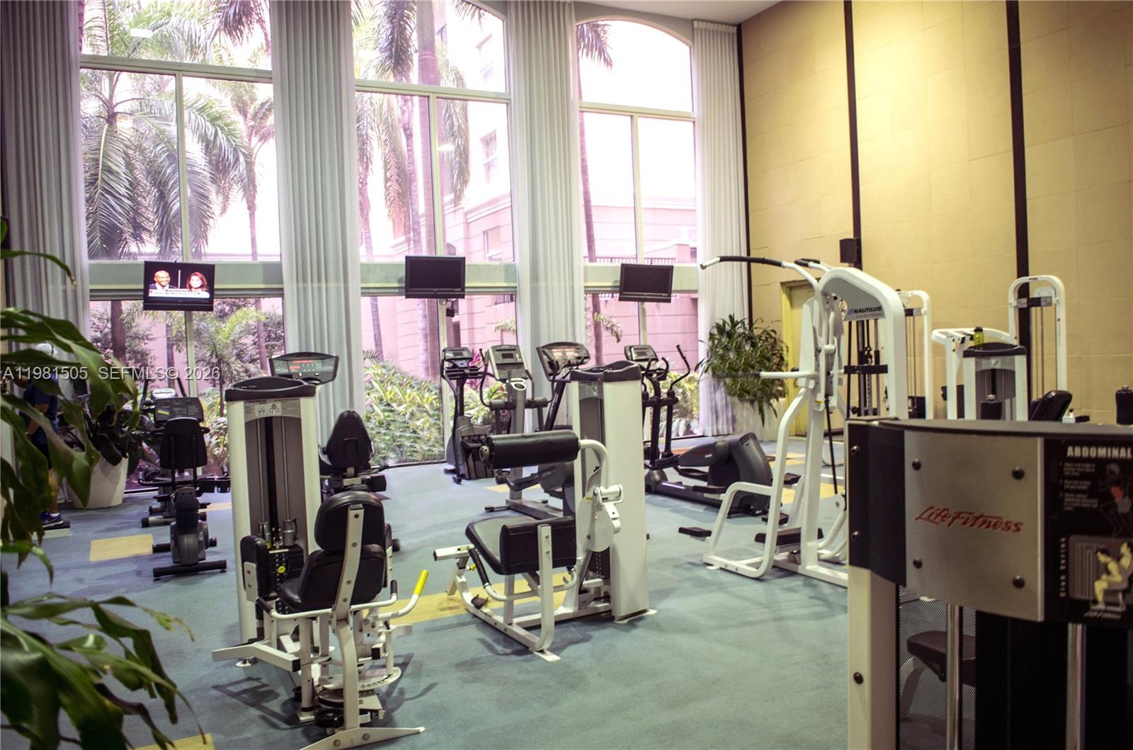 17145 North Bay Road, Unit 4203 Sunny Isles Beach, FL 33160 - Photo 42 of 50 a view of a room with gym equipment