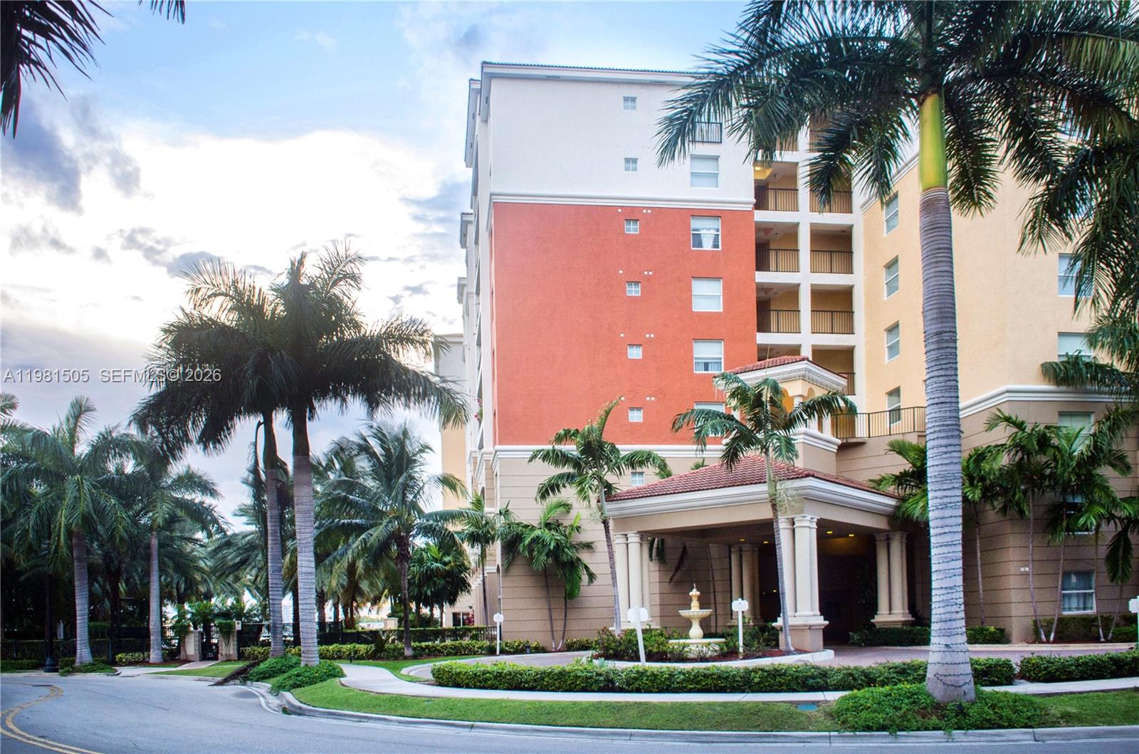 17145 North Bay Road, Unit 4203 Sunny Isles Beach, FL 33160 - Photo 50 of 50 front view of a building with a garden
