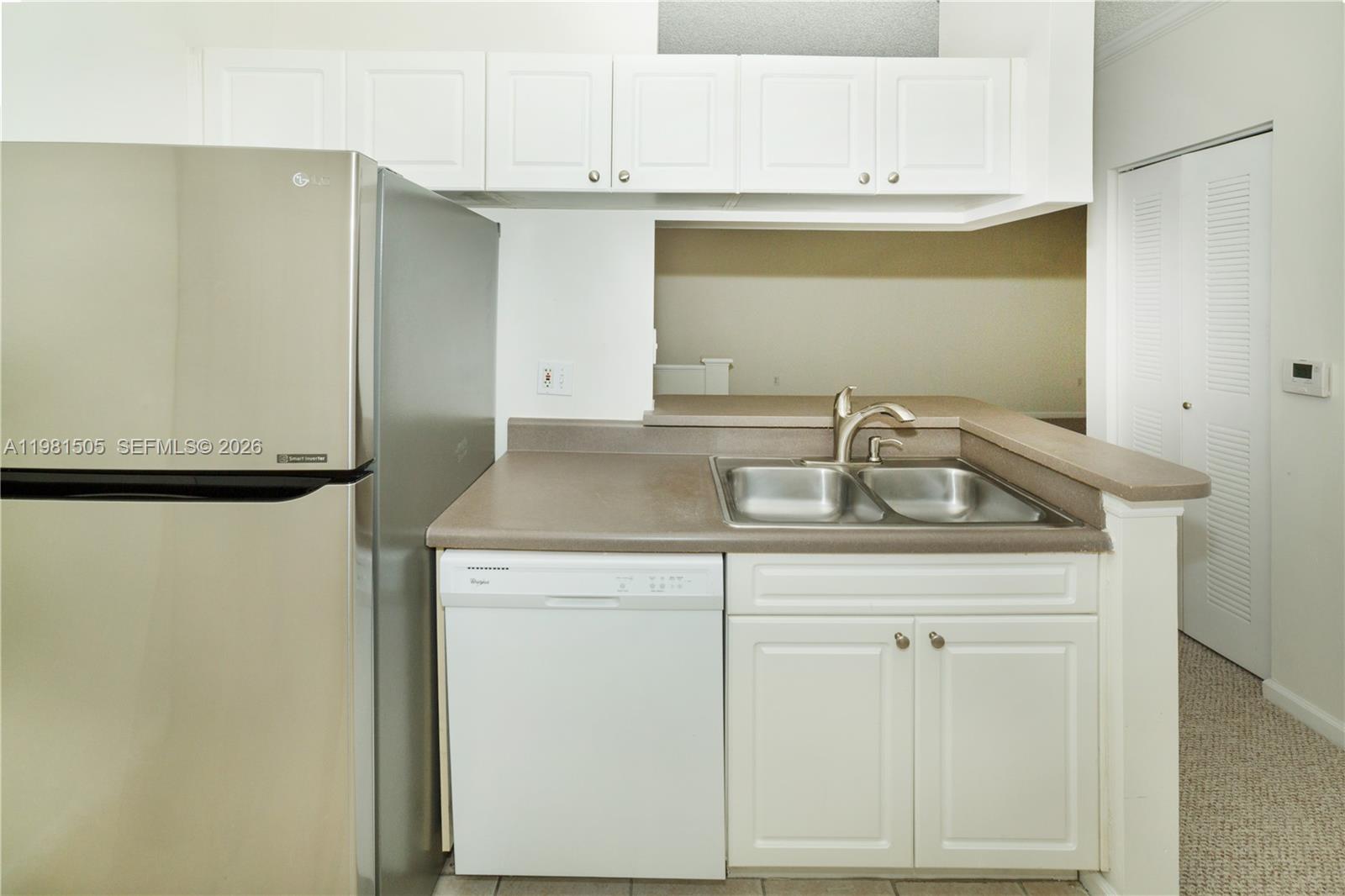 17145 North Bay Road, Unit 4203 Sunny Isles Beach, FL 33160 - Photo 9 of 50 a sink with white cabinets