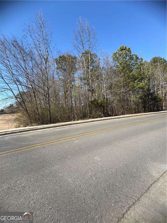 0 Fields Ferry Drive Northeast Calhoun, GA 30701 - Photo 1 of 1 a view of a house with a road