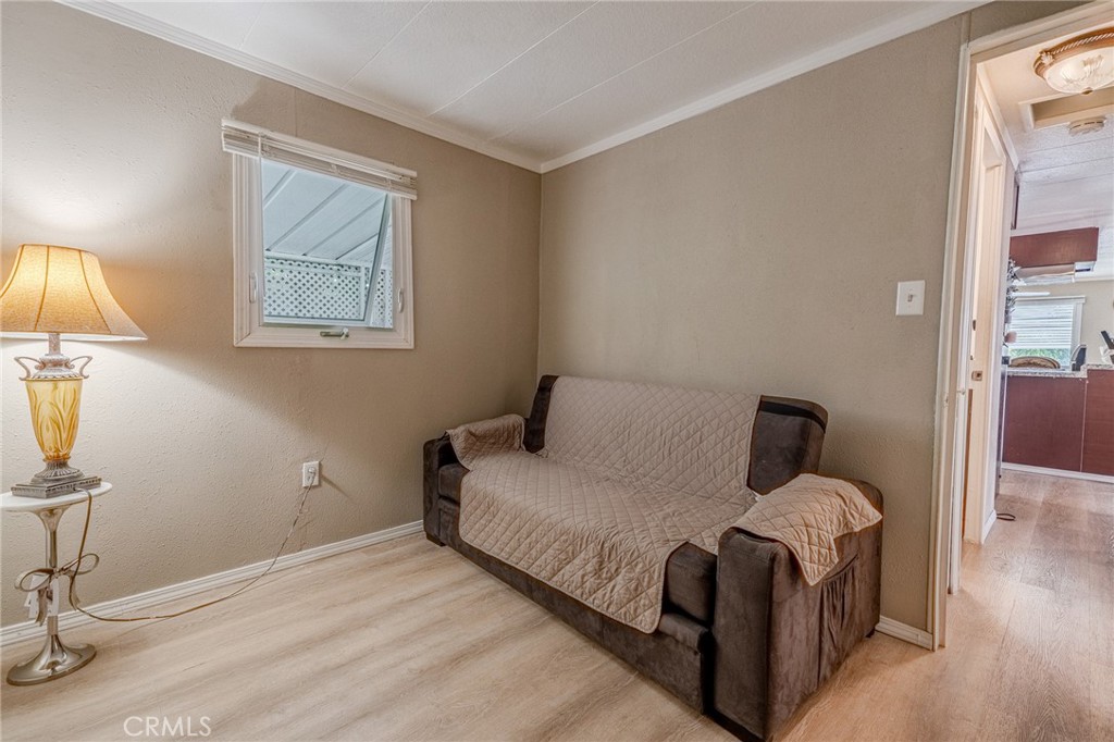 9340 Foothill Boulevard, Unit 68 Rancho Cucamonga, CA 91730 - Photo 12 of 30 a bed room with a bed and a lamp