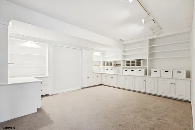 a view of cabinets and window