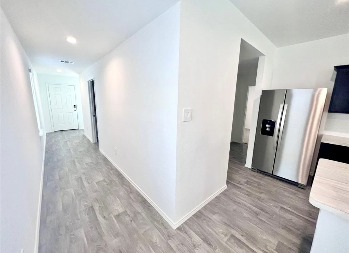 14220 Fern Meadows Drive Splendora, TX 77372 - Photo 4 of 22 a view of hallway with wooden floor