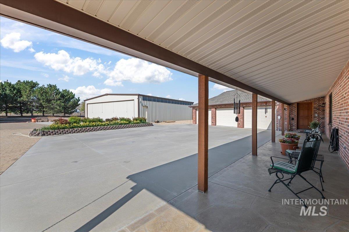 10514 Airpark Loop Road Melba, ID 83641 - Photo 30 of 50 View of patio with an outdoor structure