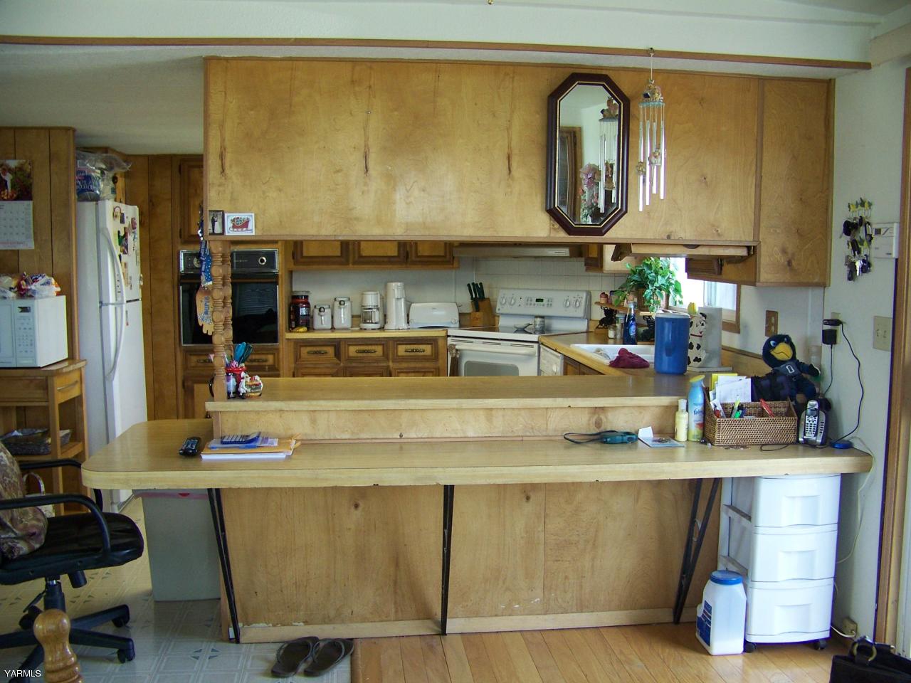 2607 Beaudry Road Yakima, WA 98901 - Photo 20 of 28 a kitchen with stainless steel appliances granite countertop a sink and cabinets