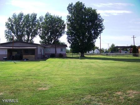 2607 Beaudry Road Yakima, WA 98901 - Photo 3 of 28 a house view with a sitting space and garden