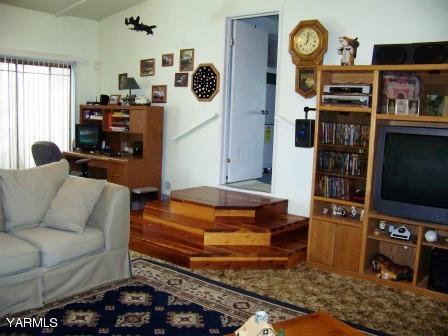 2607 Beaudry Road Yakima, WA 98901 - Photo 5 of 28 a living room with furniture and a flat screen tv