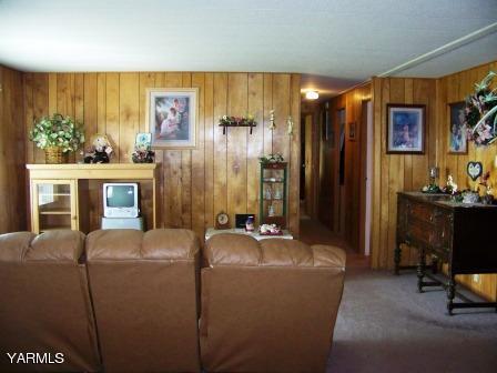 2607 Beaudry Road Yakima, WA 98901 - Photo 8 of 28 a room with furniture a flat screen tv and a window