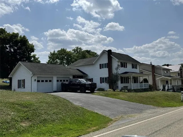 a house view with a garden space