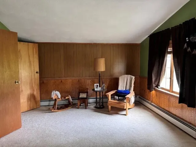 a room with furniture and a window