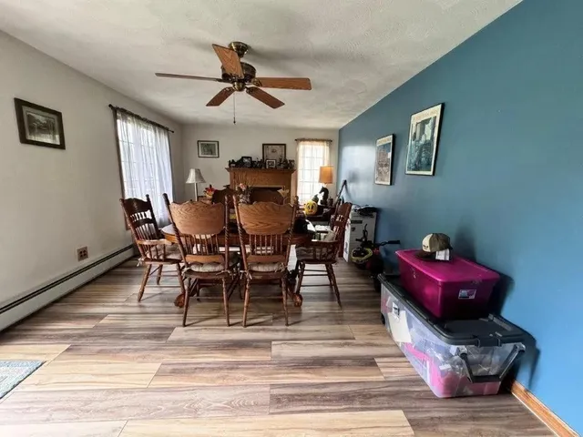 a view of a dining room with furniture