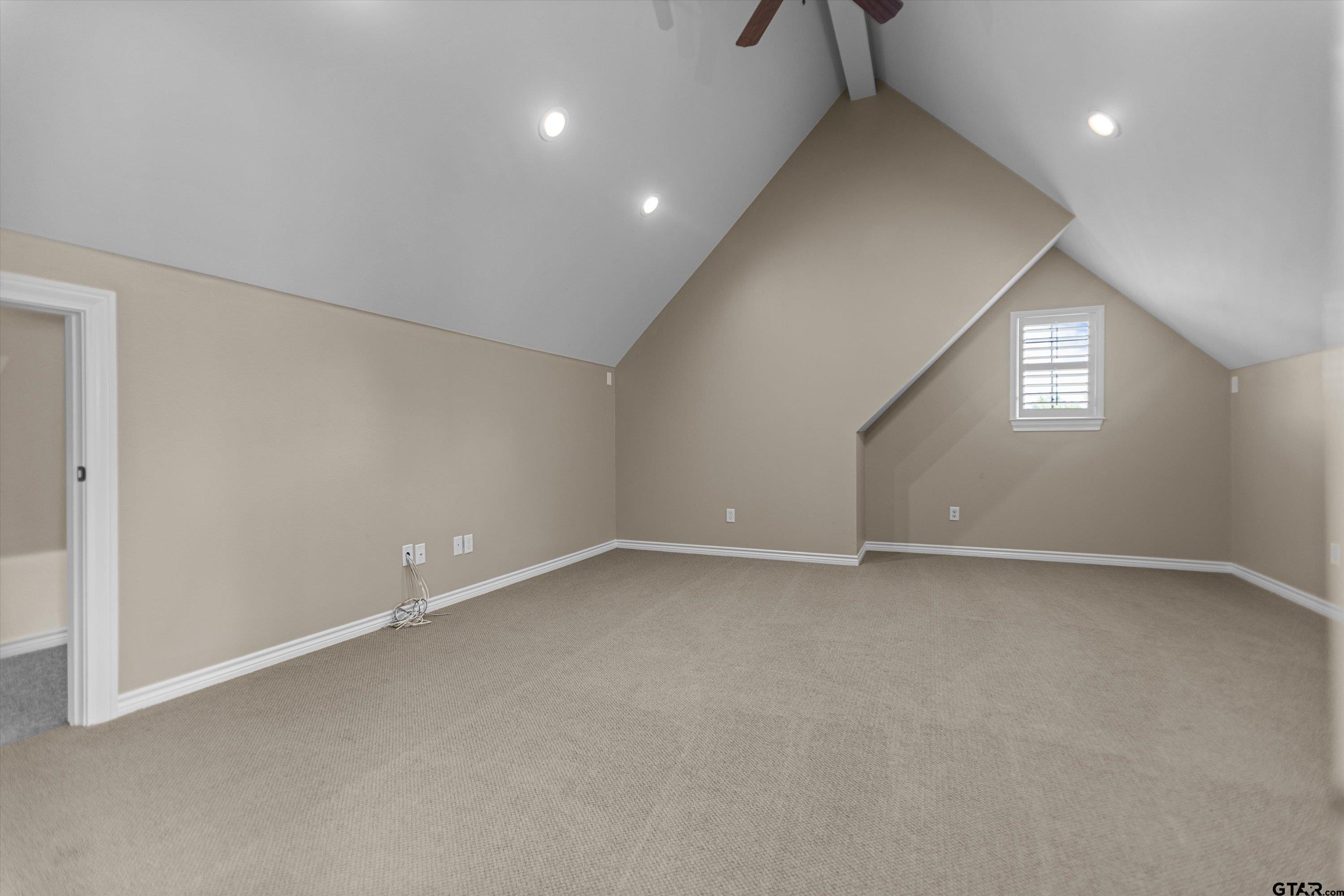 2312 Pinehurst Street Tyler, TX 75703 - Photo 33 of 43 an empty room with a empty space and windows