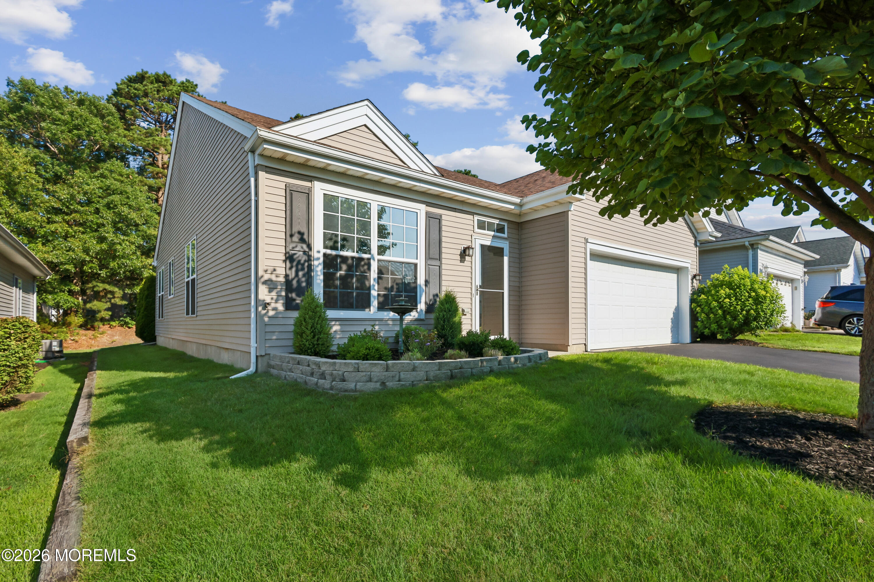 66 Sandpiper Road Barnegat, NJ 08005 - Photo 2 of 25 a view of a house with a backyard