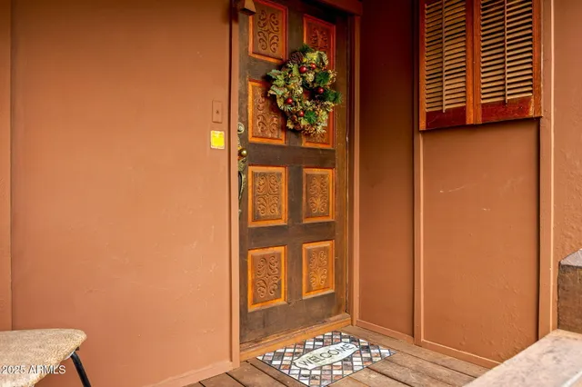 a view of swimming pool with a patio