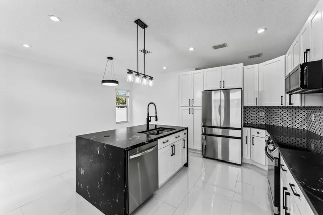 $5,000 | 6009 Royal Birkdale Drive, Lake Worth, FL 33463