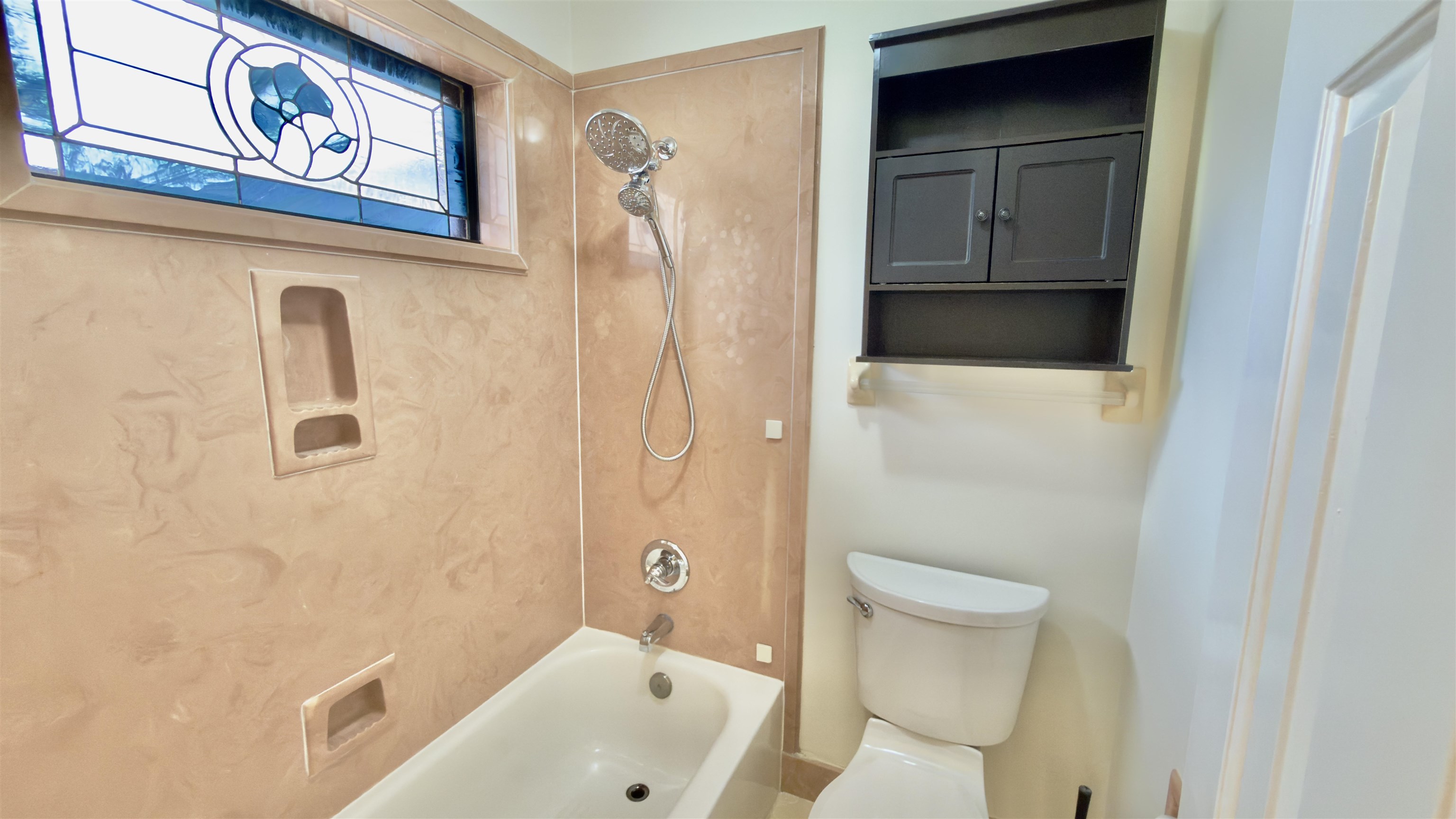 396 North Main Street Collierville, TN 38017 - Photo 14 of 23 a bathroom with a toilet and a shower