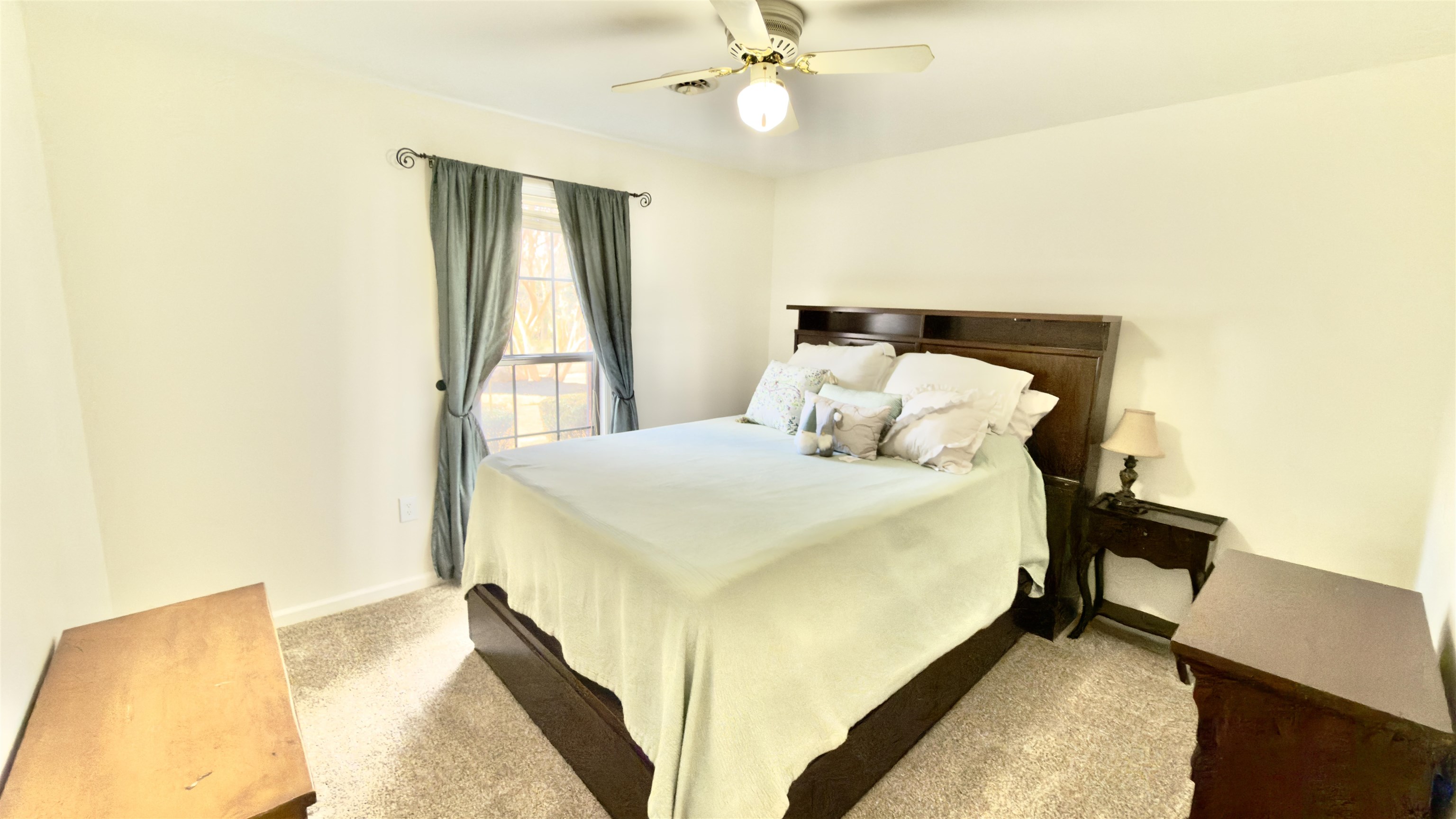 396 North Main Street Collierville, TN 38017 - Photo 15 of 23 a bedroom with a bed and a chandelier