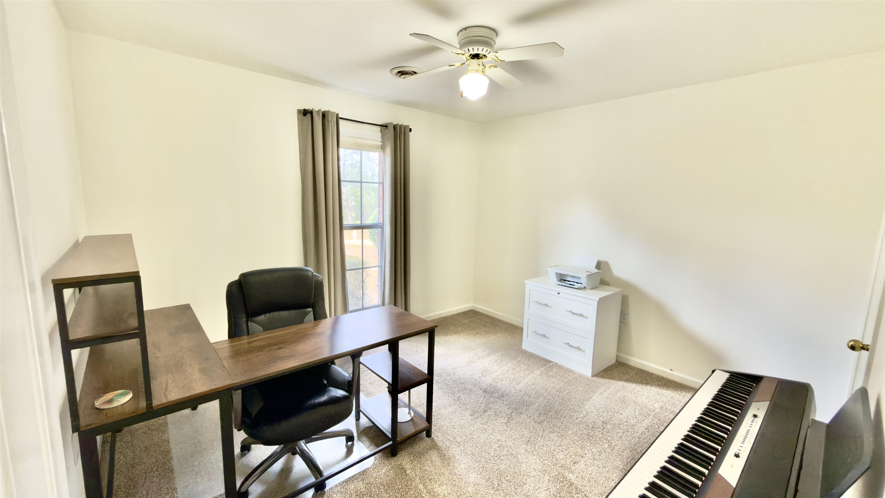 396 North Main Street Collierville, TN 38017 - Photo 17 of 23 a workspace with furniture and window