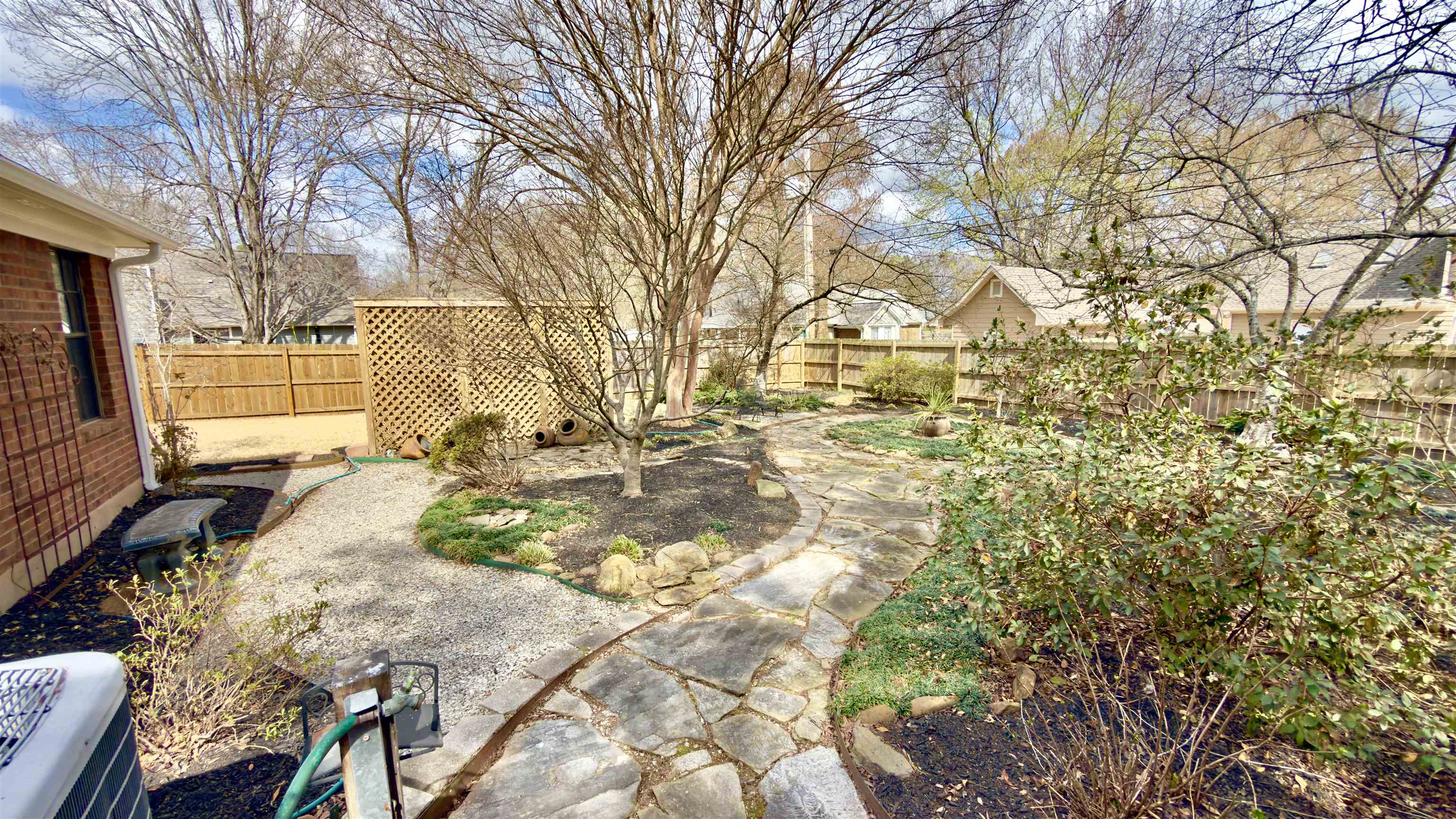 396 North Main Street Collierville, TN 38017 - Photo 20 of 23 a view of back yard of the house