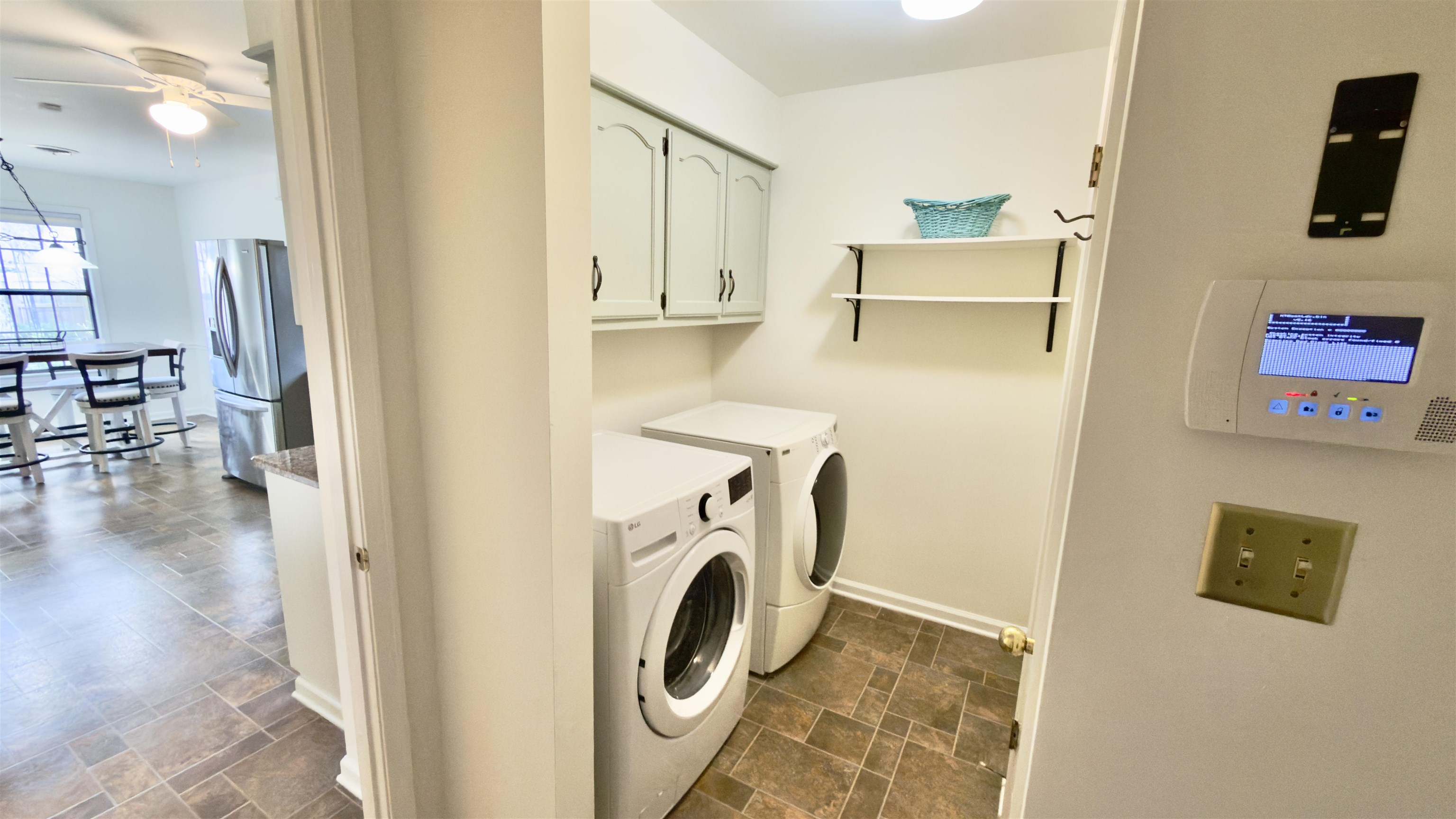 396 North Main Street Collierville, TN 38017 - Photo 8 of 23 a view of a storage and utility room with washer and dryer