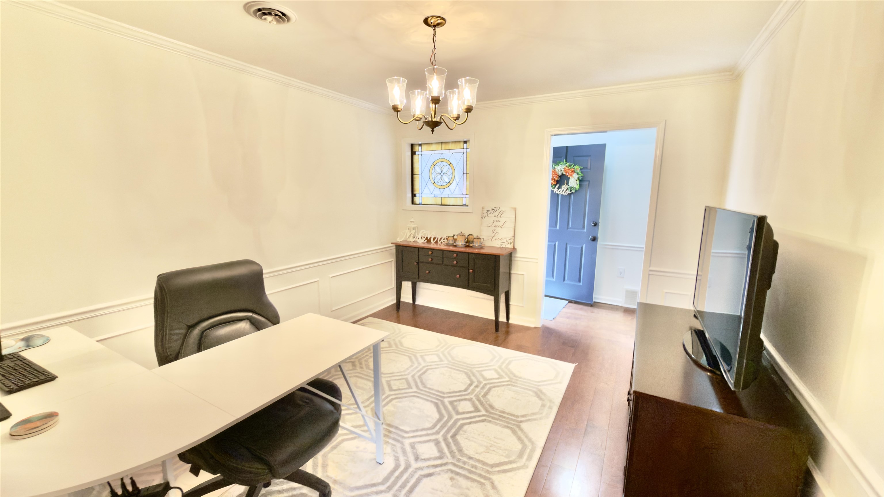 396 North Main Street Collierville, TN 38017 - Photo 9 of 23 a view of a dining room with furniture and a chandelier
