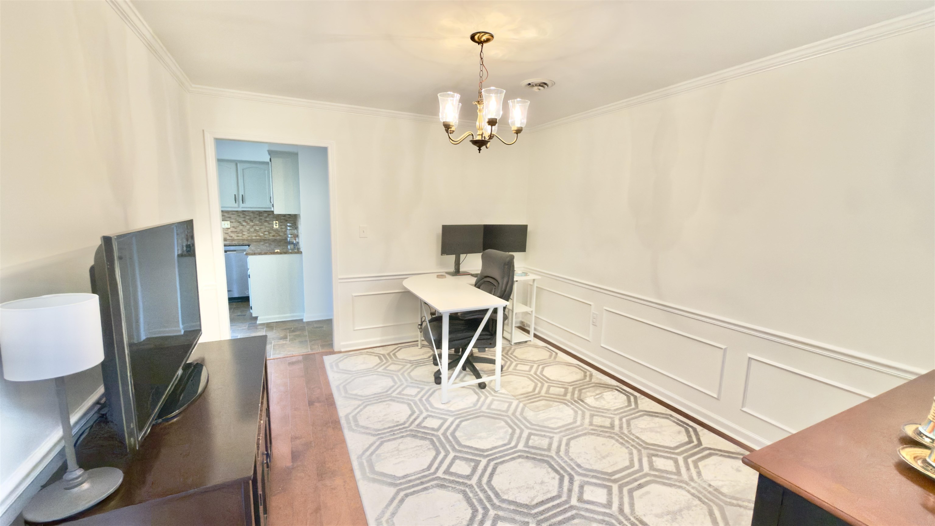 396 North Main Street Collierville, TN 38017 - Photo 10 of 23 a living room with furniture and a chandelier