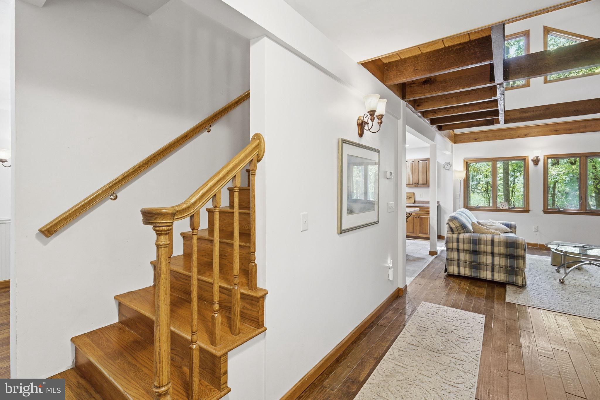 22300 Frazier Road Rock Hall, MD 21661 - Photo 13 of 38 a view of entryway and hall with wooden floor