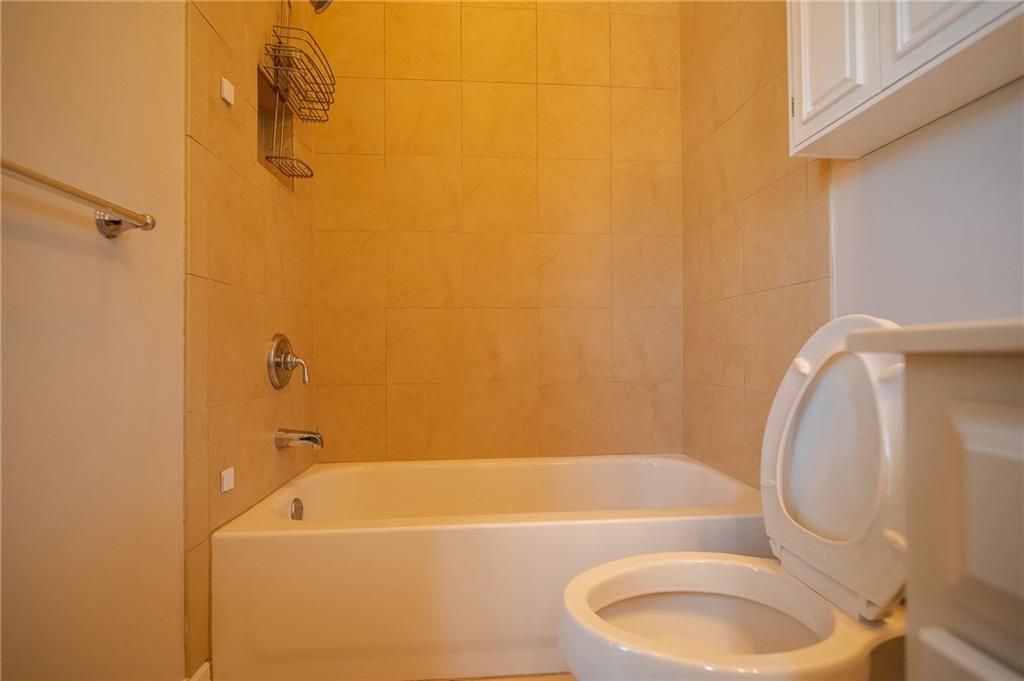1207 Discover Green Lane, Unit 20 Mableton, GA 30126 - Photo 23 of 29 a bathroom with a bath tub