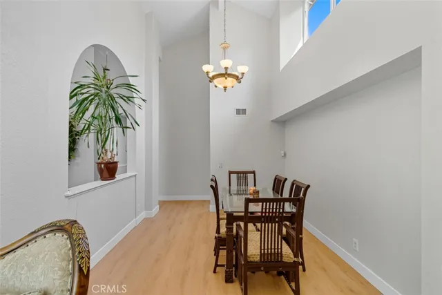 a bed room with two beds and a window