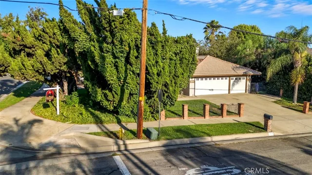 an aerial view of residential house with an outdoor space