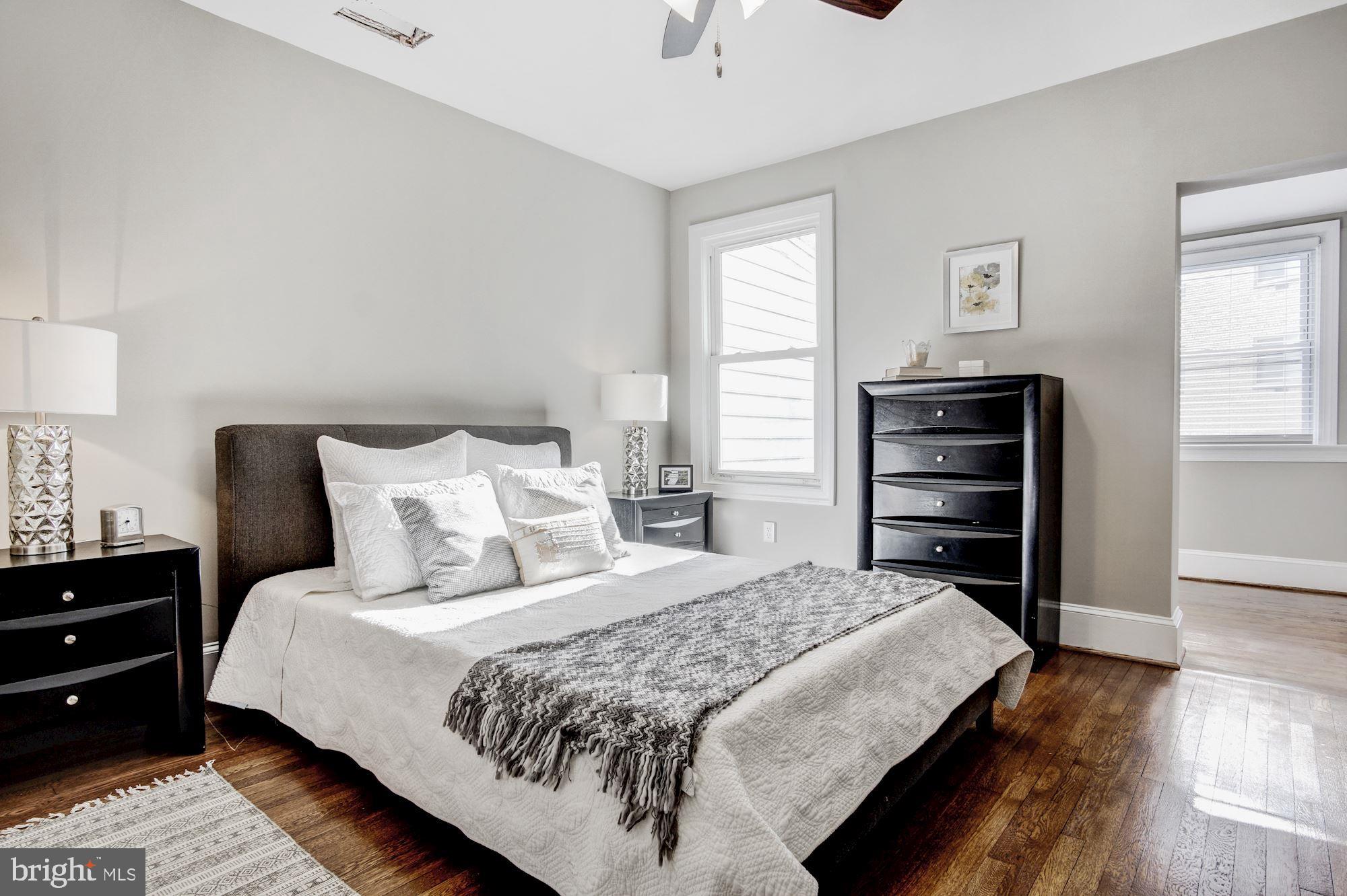 1508 Spring Place Northwest Washington, DC 20010 - Photo 23 of 48 Master bedroom w/ beautiful original wood floors!