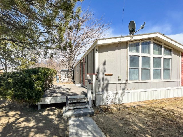 216 Valley Road Bishop, CA 93514 - Photo 1 of 27 a front view of a house with a yard