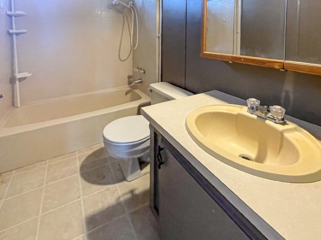 216 Valley Road Bishop, CA 93514 - Photo 17 of 27 a bathroom with a sink toilet and shower