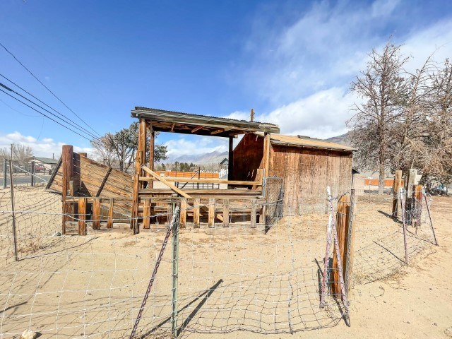 216 Valley Road Bishop, CA 93514 - Photo 25 of 27 a house with trees in the background