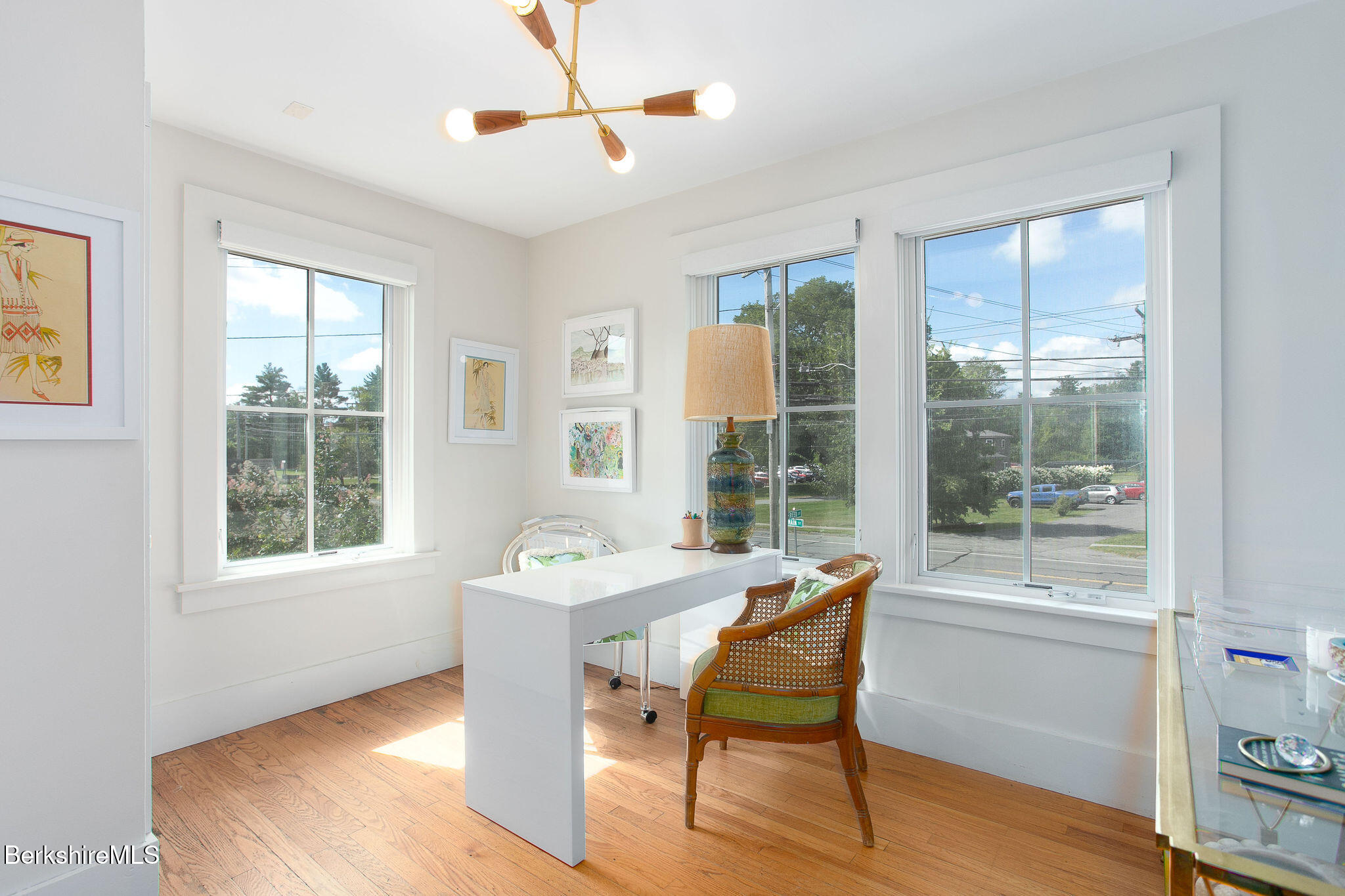 783 Main Street Great Barrington, MA 01230 - Photo 8 of 31 a dining room with a table and chairs