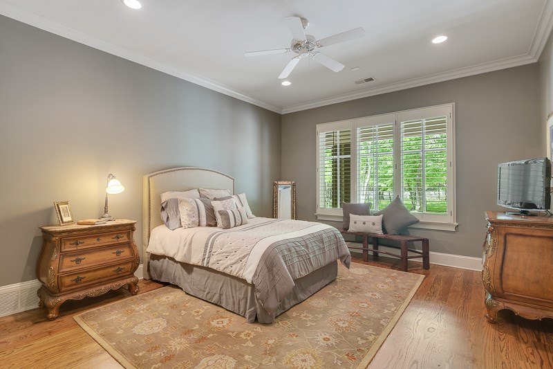 336 Pisgah Road Eads, TN 38028 - Photo 12 of 25 Guest suite on the first level boasts a large extravagant private bath, triple windows, and hardwood flooring.