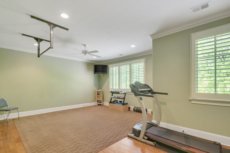 336 Pisgah Road Eads, TN 38028 - Photo 17 of 25 The fifth bedroom, currently being used as an exercise room, is also sizeable and has a large walk in closet.