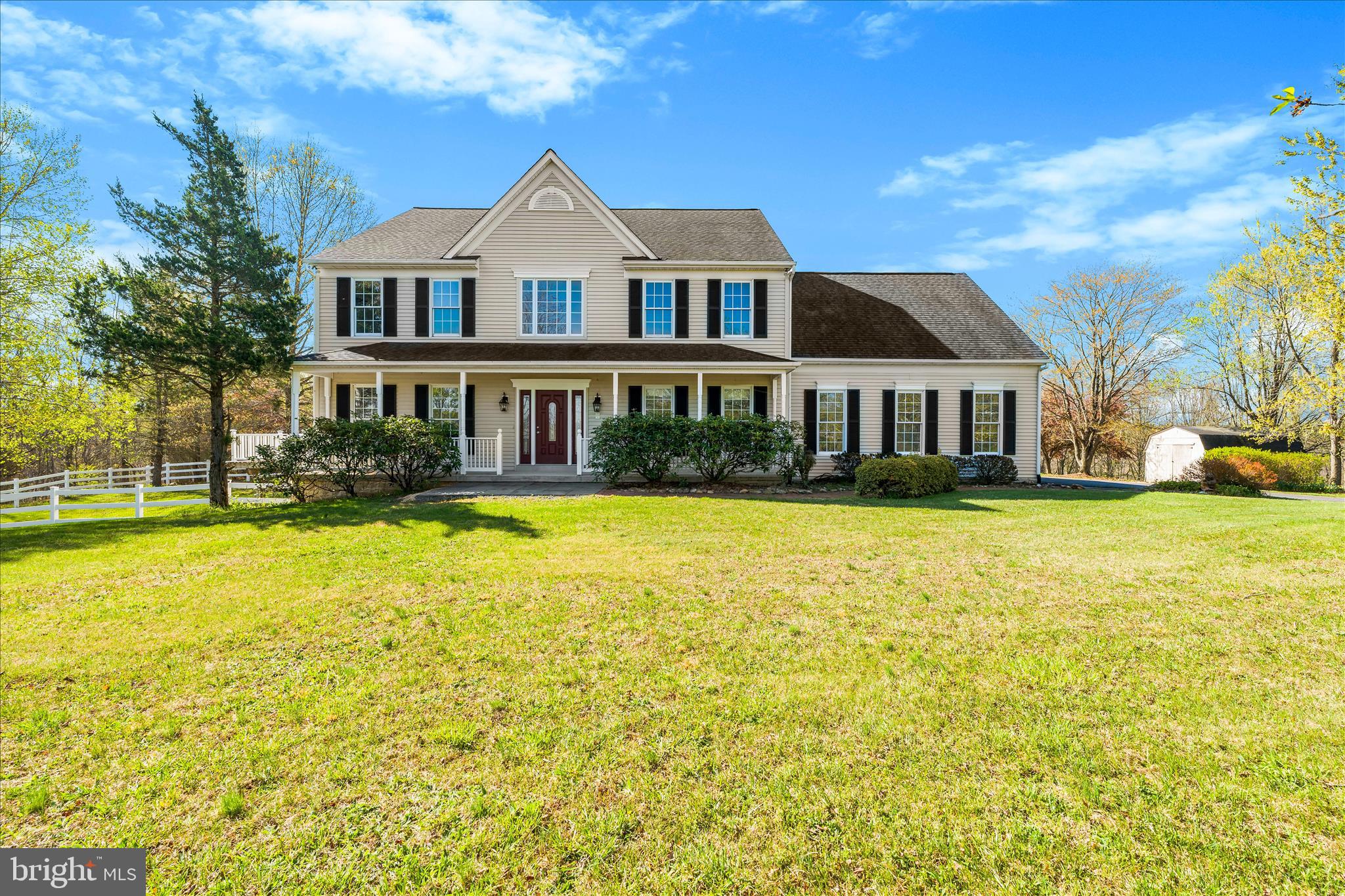 a front view of a building with swimming pool